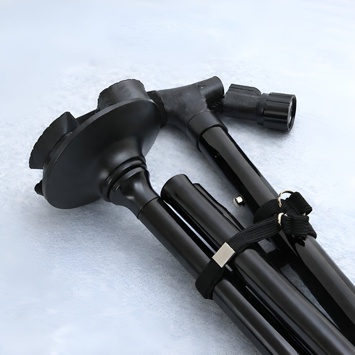 Baston plegable portatil con linterna