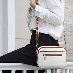 Bolsos de cuero con correas de colores